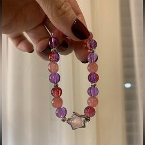 Pink and purple sparkly beaded bracelet with star pendant